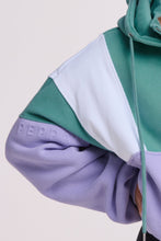 Load image into Gallery viewer, Hip length, full zip hoodie, with ribbed panels, embossed sleeve logo, in a slouchy oversize fit, in green, lavender and white.
