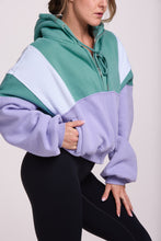 Load image into Gallery viewer, Hip length, full zip hoodie, with ribbed panels, embossed sleeve logo, in a slouchy oversize fit, in green, lavender and white.
