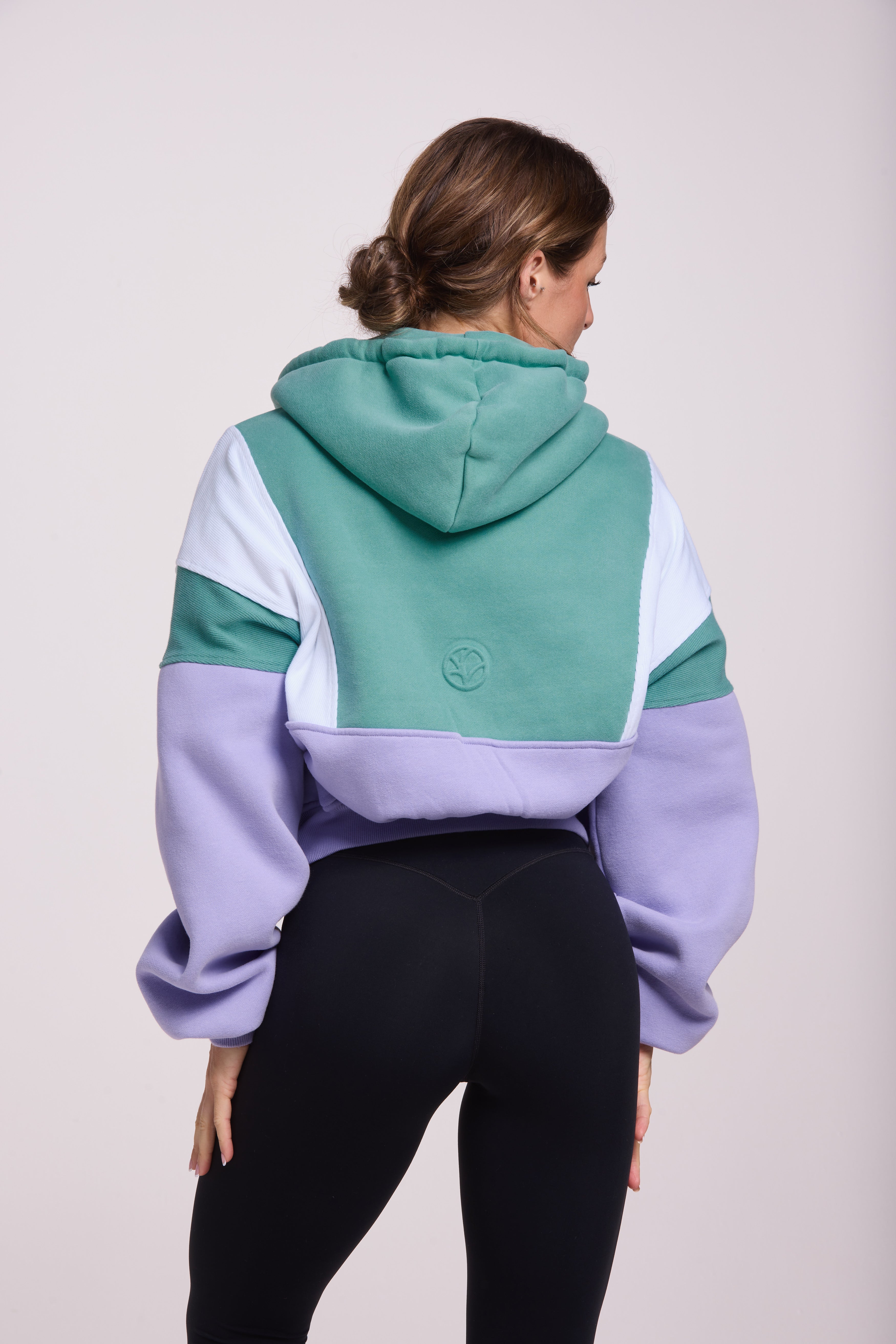 Hip length, full zip hoodie, with ribbed panels, embossed sleeve logo, in a slouchy oversize fit, in green, lavender and white.