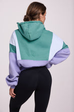Load image into Gallery viewer, Hip length, full zip hoodie, with ribbed panels, embossed sleeve logo, in a slouchy oversize fit, in green, lavender and white.
