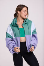 Load image into Gallery viewer, Hip length, full zip hoodie, with ribbed panels, embossed sleeve logo, in a slouchy oversize fit, in green, lavender and white.
