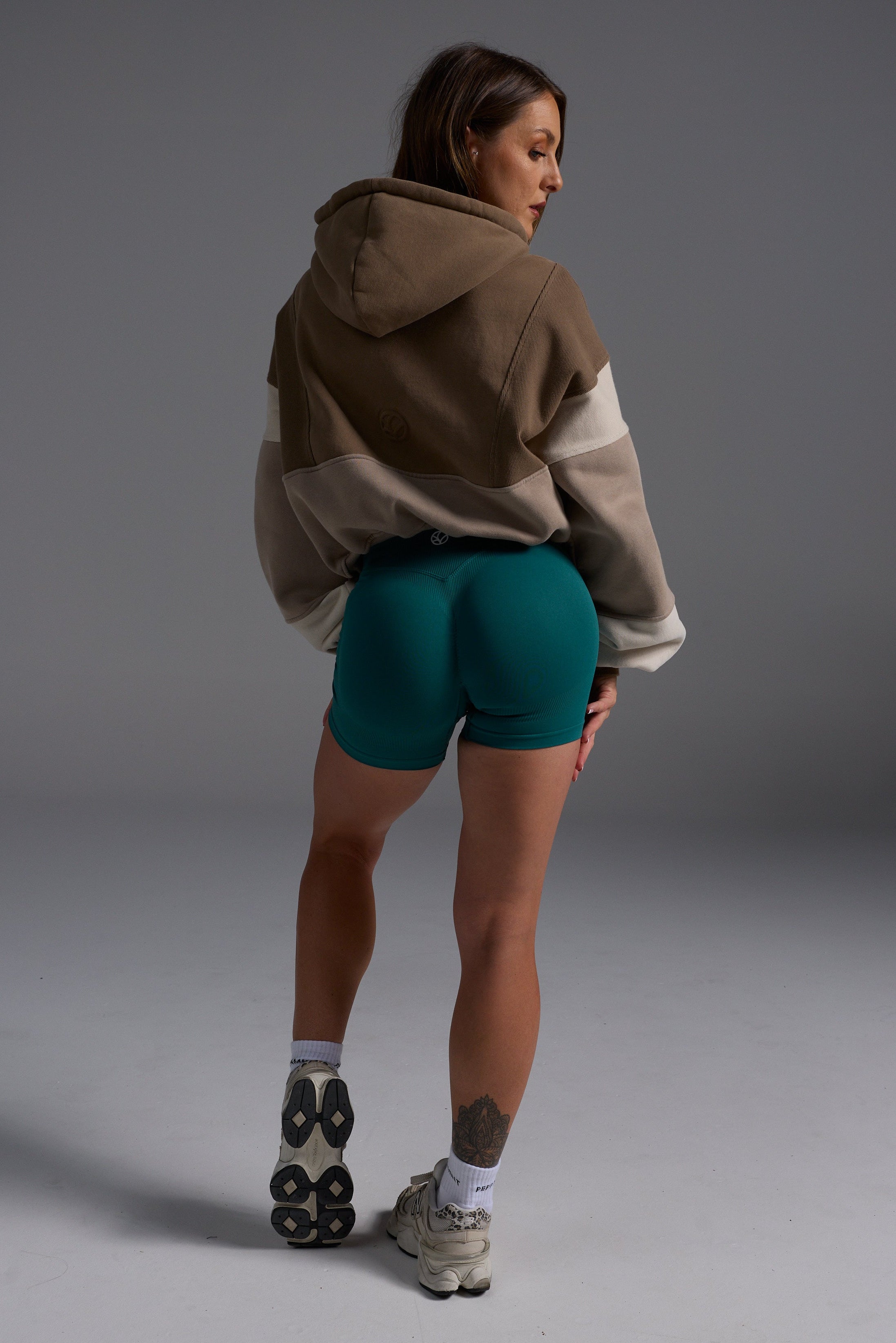 Hip length, full zip hoodie, with ribbed panels, embossed sleeve logo, in a slouchy oversize fit, with 2 convenient zip pockets, in mocha, stone and beige