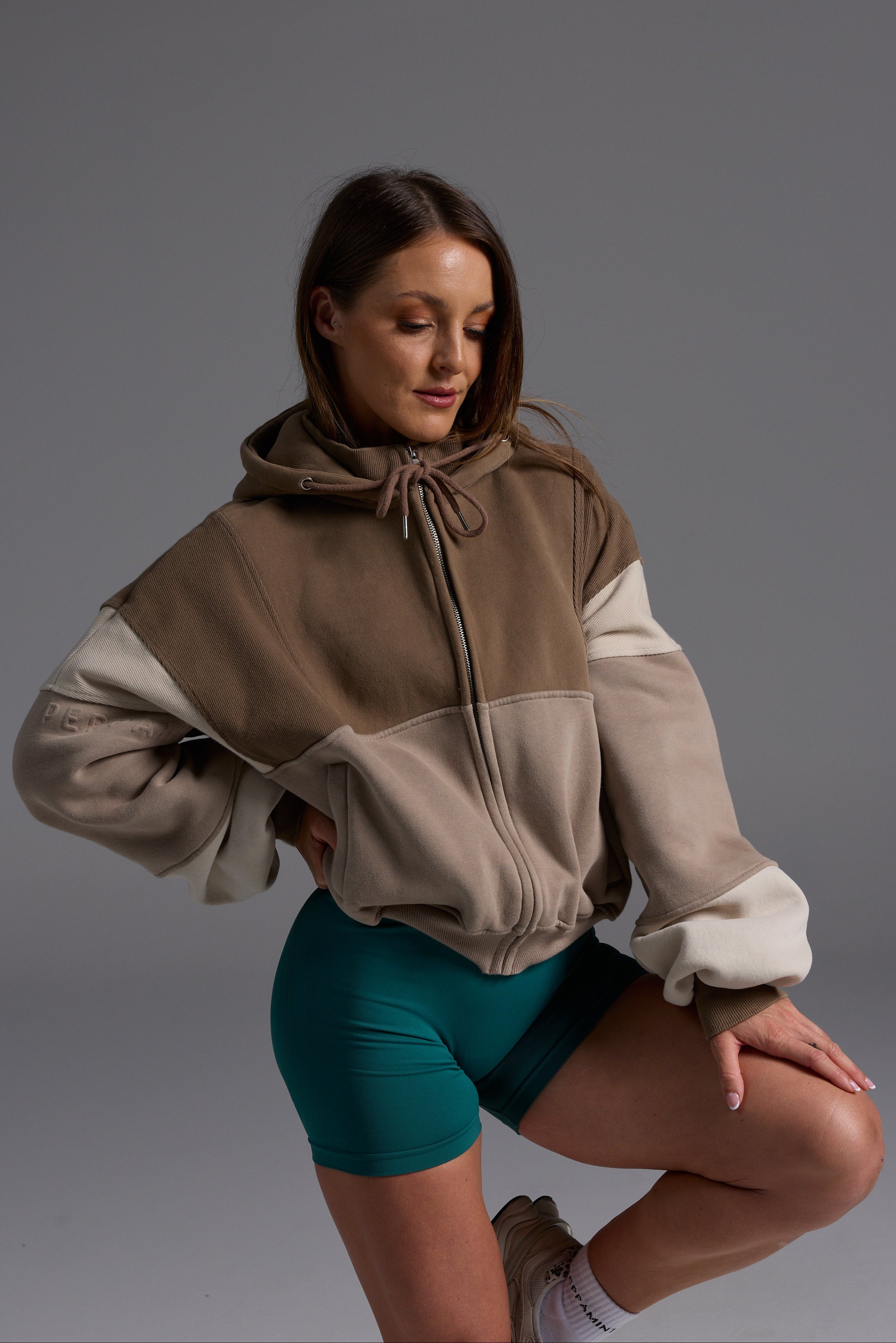 Hip length, full zip hoodie, with ribbed panels, embossed sleeve logo, in a slouchy oversize fit, with 2 convenient zip pockets, in mocha, stone and beige