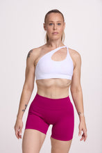Load image into Gallery viewer, Front cross over strap activewear bra in seamless fabric with adjustable back straps, and ribbed supportive underbust band in white and seamless gym tights with booty contouring panels, invisible scrunch technology, sweetheart shaped back seams and thick supportive fabric in magenta pink
