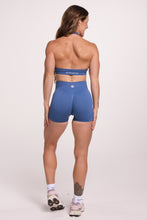 Load image into Gallery viewer, Seamless halter bra with a thick supportive fabric blend and a branded back strap, with a ribbed elastic hem and seamless gym tights with booty contouring panels, invisible scrunch technology, sweetheart shaped back seams and thick supportive fabric in grey blue colour
