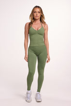 Load image into Gallery viewer, Halter neck tank top with breast contouring panels and a ruched front seam, a built in bra, and an open upper back design and seamless gym tights with booty contouring panels, invisible scrunch technology, sweetheart shaped back seams and thick supportive fabrics in mermaid green colour
