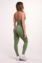 Load image into Gallery viewer, Halter neck tank top with breast contouring panels and a ruched front seam, a built in bra, and an open upper back design and seamless gym tights with booty contouring panels, invisible scrunch technology, sweetheart shaped back seams and thick supportive fabrics in mermaid green colour
