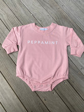 Load image into Gallery viewer, Oversize/Slouch fit baby bodysuit in lavender made of french terry cotton fabric, with white branded Peppamint logo centre chest
