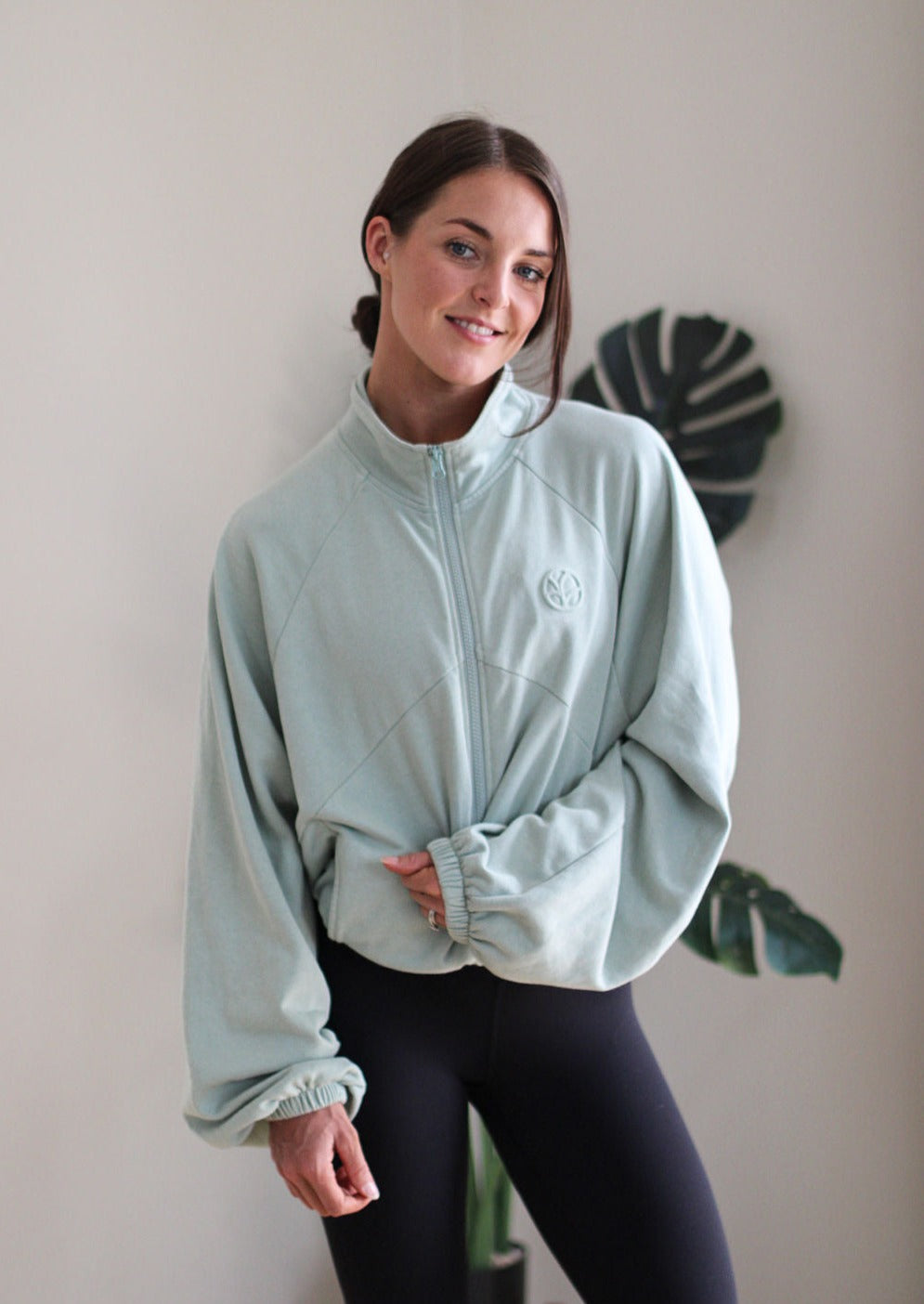 French terry cotton zip jacket with embossed logo, drawstring adjustable hem, oversize sleeves in sage green
